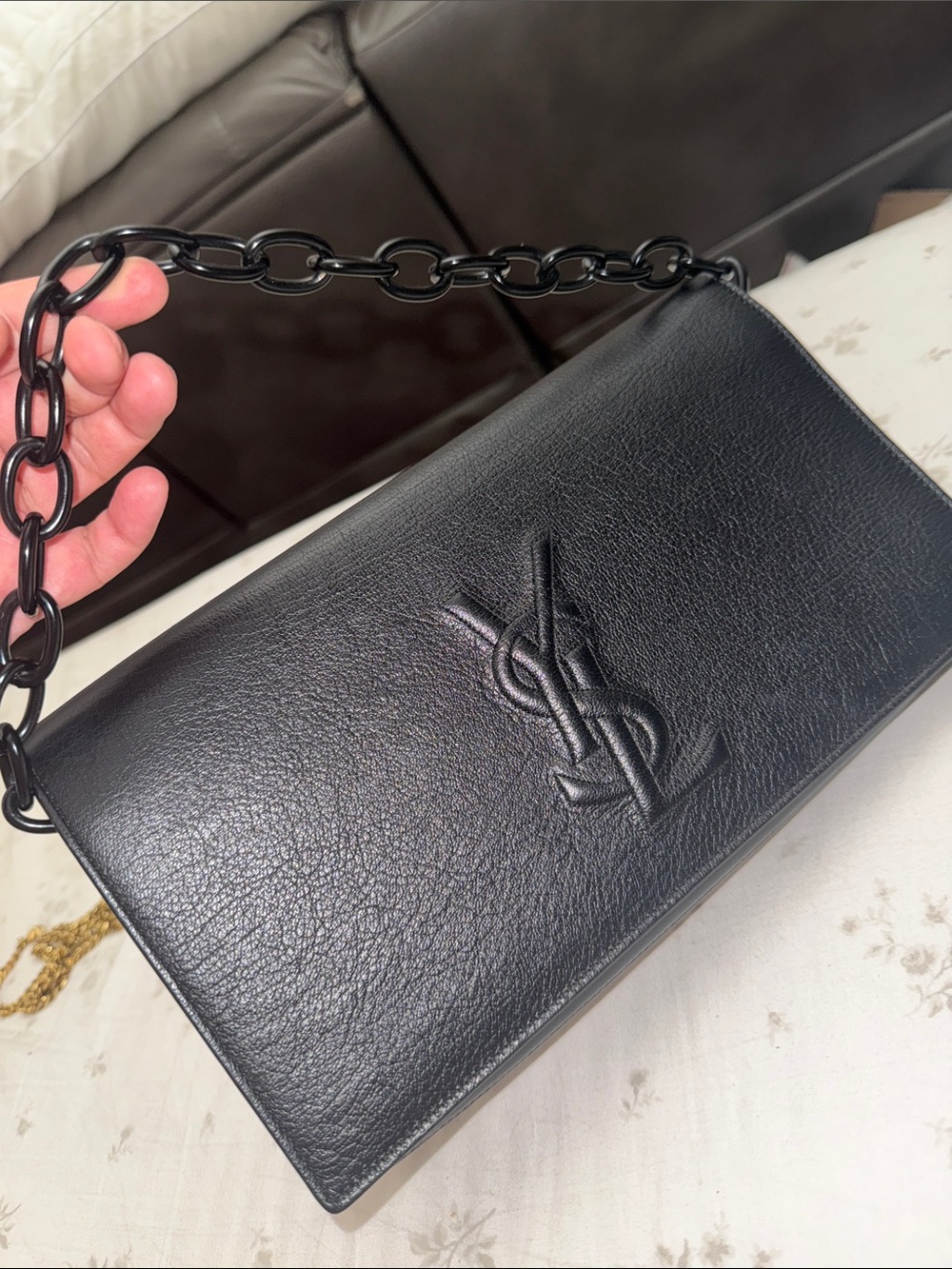 YSL Belle de jour black leather clutch